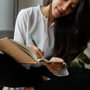 woman-writing-in-journal-how-to-start-journaling
